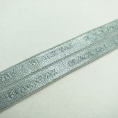 Debossed elastic webbing floded